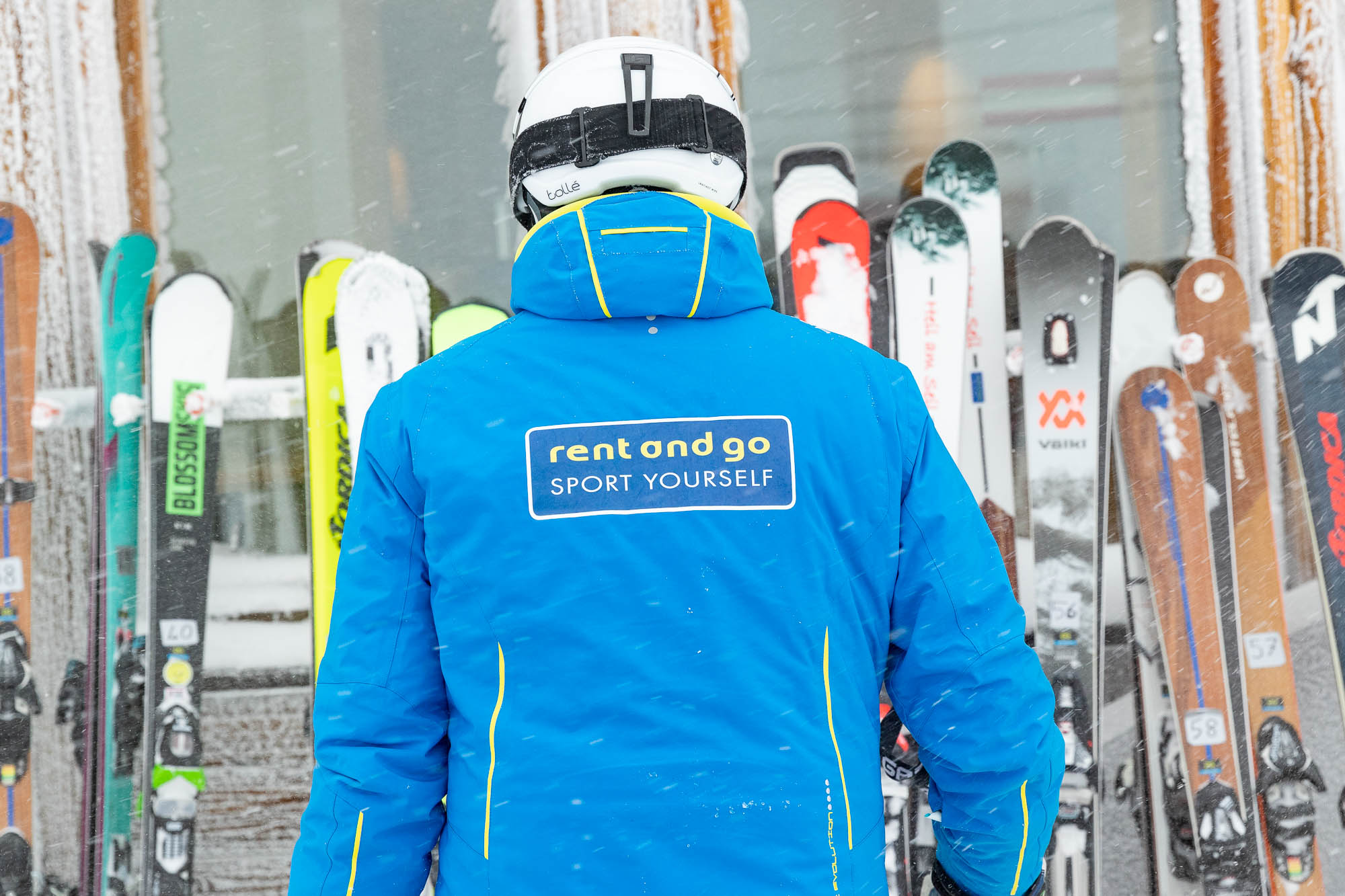 skier with helmet, mandatory for minors in Italy